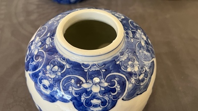 A pair of Chinese Canton famille rose vases and a pair of blue and white covered jars, 19th C.