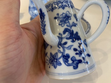 A rare Chinese blue and white set of two jugs and two casters on stand, Qianlong