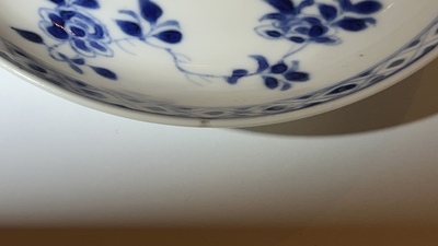 A pair of Chinese blue and white cups and saucers, Chenghua mark, Kangxi