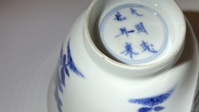 A pair of Chinese blue and white cups and saucers, Chenghua mark, Kangxi