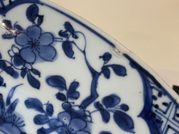 A pair of Chinese blue and white 'mountainous landscape' dishes, Kangxi