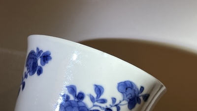 A pair of Chinese blue and white cups and saucers, Chenghua mark, Kangxi