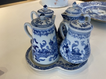 A rare Chinese blue and white set of two jugs and two casters on stand, Qianlong