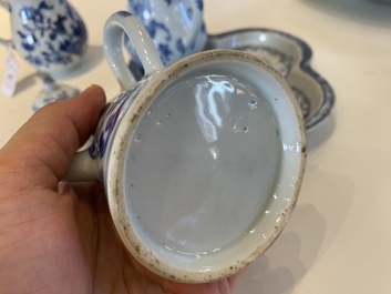 A rare Chinese blue and white set of two jugs and two casters on stand, Qianlong