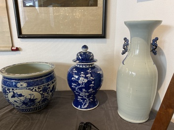 A Chinese blue and white 'landscape' vase, a covered vase and a jardini&egrave;re, 19th C.