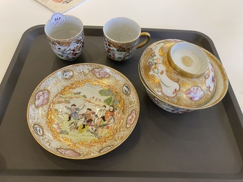 A Chinese famille rose covered bowl, a saucer and two cups with a hunting scene, Qianlong