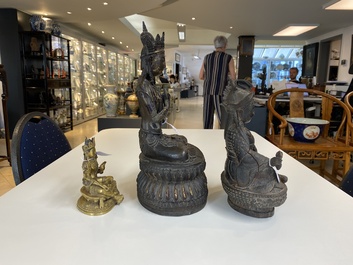 Two Tibetan gilt bronze and one iron sculpture of Buddha, 19/20th C.