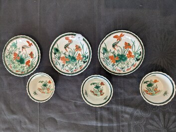 Three Chinese Kangxi-style caf&eacute;-au-lait-ground famille verte cups and saucers, rabbit mark, 19th C.