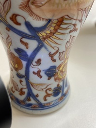 A Chinese grisaille garniture of five 'phoenix' vases, Kangxi/Yongzheng