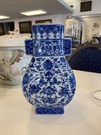 A Chinese blue and white 'fanghu' vase with lotus scrolls, Qianlong mark, 19/20th C.