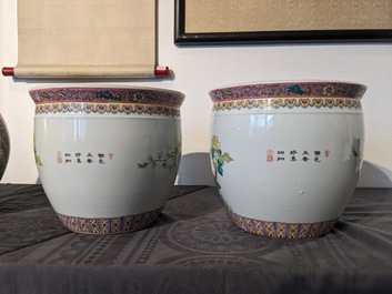 A Chinese famille rose 'hu' vase and a pair of fish bowls, 20th C.