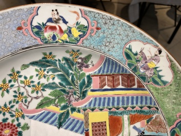 A large Chinese famille rose dish with a temple scene and eight immortals on the rim, Yongzheng
