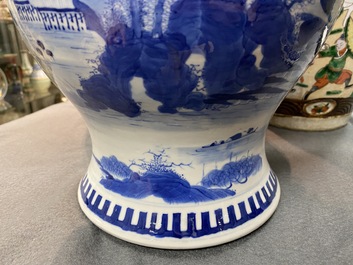 A pair of Chinese blue and white covered vases and a pair of Nanking famille rose vases, 19th C.