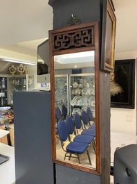 A Chinese wooden mirror and a foldable stool, 19/20th C.