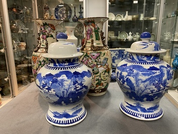 A pair of Chinese blue and white covered vases and a pair of Nanking famille rose vases, 19th C.