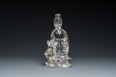A large Chinese rock crystal sculpture of Lan Caihe, 19th C.