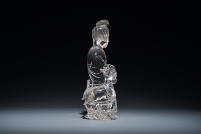 A large Chinese rock crystal sculpture of Lan Caihe, 19th C.