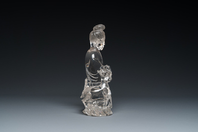 A large Chinese rock crystal sculpture of Lan Caihe, 19th C.