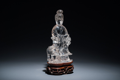 A large Chinese rock crystal sculpture of Lan Caihe, 19th C.