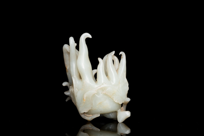 A fine Chinese white jade carving of a Buddha's hand on wooden stand, Qing