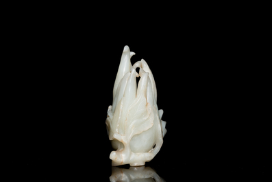 A fine Chinese white jade carving of a Buddha's hand on wooden stand, Qing