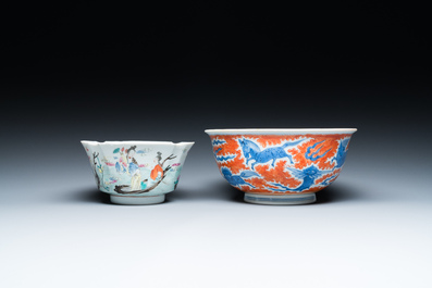 A Chinese blue, white and iron-red 'dragon' bowl and a famille rose 'immortals' bowl, Jiaqing and Wanli mark, 19th C.