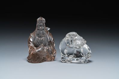 Two Chinese rock crystal sculptures of a sage with a turtle and of a Buddhist lion, 19th C.