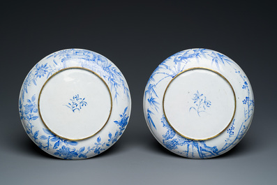 A pair of Chinese Canton enamel 'Master of the Rocks' plates, Yongzheng/Qianlong