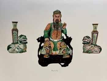 A pair of Chinese verte biscuit vases resting on Buddhist lions, Kangxi