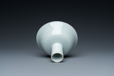 A Chinese monochrome white-glazed stem cup with anhua dragon design, Qianlong mark, 18/19th C.