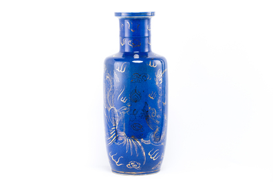 A Chinese powder blue-glazed rouleau vase with gilt 'dragon and phoenix' design, 19th C.