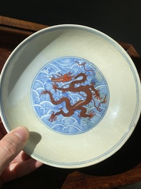 A pair of Chinese iron-red and underglaze-blue 'dragon' dishes, Qianlong mark and of the period