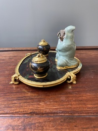 A French lacquered and painted wood, gilt bronze and Japanese celadon porcelain inkwell desk set, late 18th C.