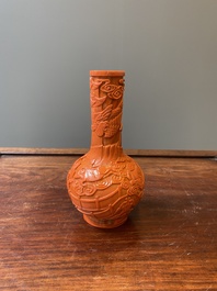 An unusual Chinese coral-red Peking glass bottle vase, Daoguang mark and probably of the period