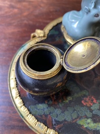 A French lacquered and painted wood, gilt bronze and Japanese celadon porcelain inkwell desk set, late 18th C.