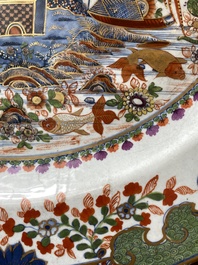 An exceptionally large Chinese English-decorated blue and white dish with 'mythical animals', Qianlong