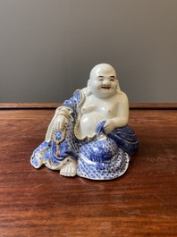 A Chinese blue and white seated Buddha, You Lin Ji Zao 游林記造 mark, Republic
