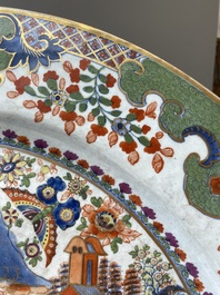 An exceptionally large Chinese English-decorated blue and white dish with 'mythical animals', Qianlong