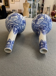 A pair of Chinese blue and white bottle vases with mythical animals, 19th C.