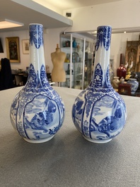 A pair of Chinese blue and white bottle vases with mythical animals, 19th C.