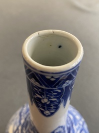 A pair of Chinese blue and white bottle vases with mythical animals, 19th C.