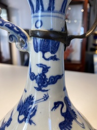 A Chinese blue and white jug with cranes among clouds, Chang Ming Fu Gui 長命富貴 mark, Ming