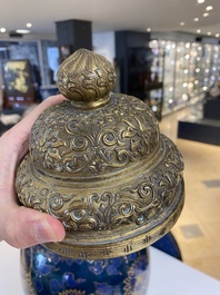 A Chinese powder-blue vase with gilt lotus scrolls and a matching gilt cover, Kangxi