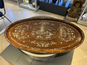 An extremely large Chinese mother-of-pearl-inlaid wooden tray with a central pavillion design, 19th C.