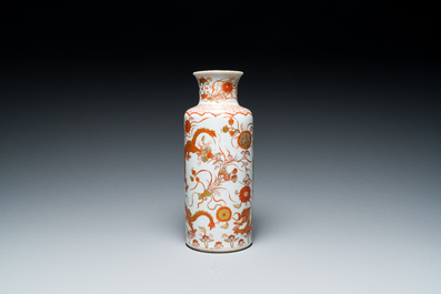 A Chinese iron-red and gilt rouleau 'dragons' vase, Kangxi