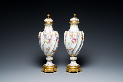 A pair of polychrome H&ouml;chst porcelain vases with gilt-bronze mounts, Germany, 19th C.