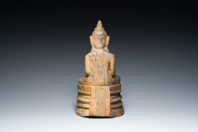 A Burmese partly gilt and lacquered teak wooden Buddha, Hanthawaddy Kingdom, 16th C.