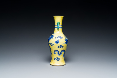 A Chinese blue and white yellow-ground 'dragon' vase with green-glazed handles on a jade-inset wooden stand, Jiaqing mark, 19/20th C.