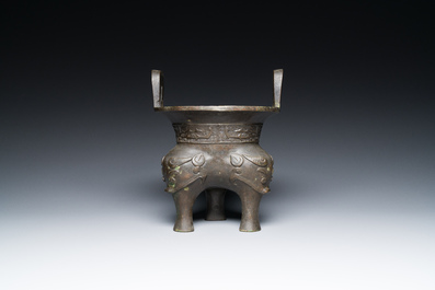 A Chinese archaic bronze tripod censer, 'ding', Ming