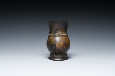 A Chinese inscribed archaic bronze ritual wine vessel, 'zhi', late Shang dynasty